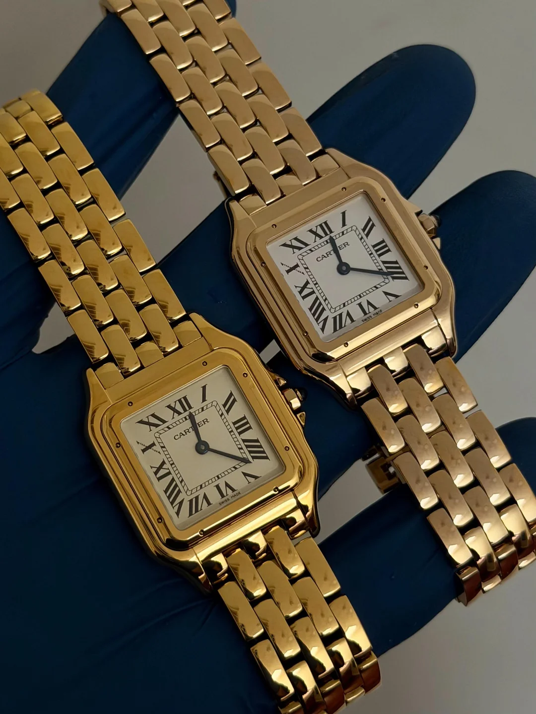 Pair of yellow gold square watches side by side: left in unfinished stock PVD, right fully replated